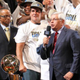 David Stern (right) presents 2011 NBA trophy to Mark Cuban.(Mike Ehrmann/Getty Images)